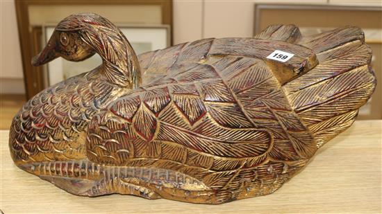 An Oriental lacquered wood duck length 54cm height 20cm